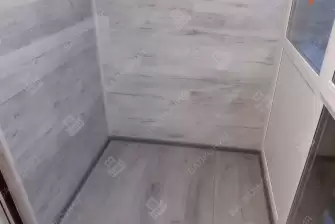 Отделка балкона с установкой теплого пола и остекление Рехау 70