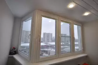 Теплое остекление балкона Сапожок окнами ПВХ Рехау