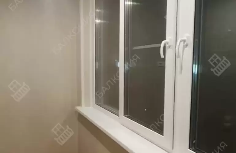 Остекление балкона и балконного блока профилем Рехау 60 и отделка панелями ПВХ